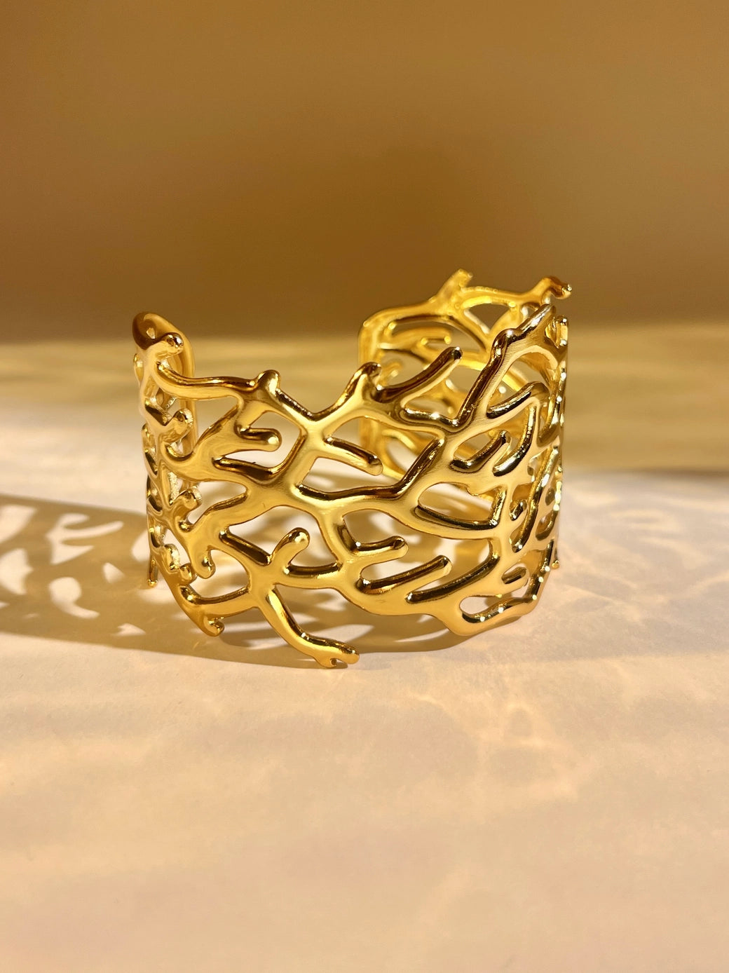 Gold Openwork Cuff Bracelet – Chic Coral Design, Steel